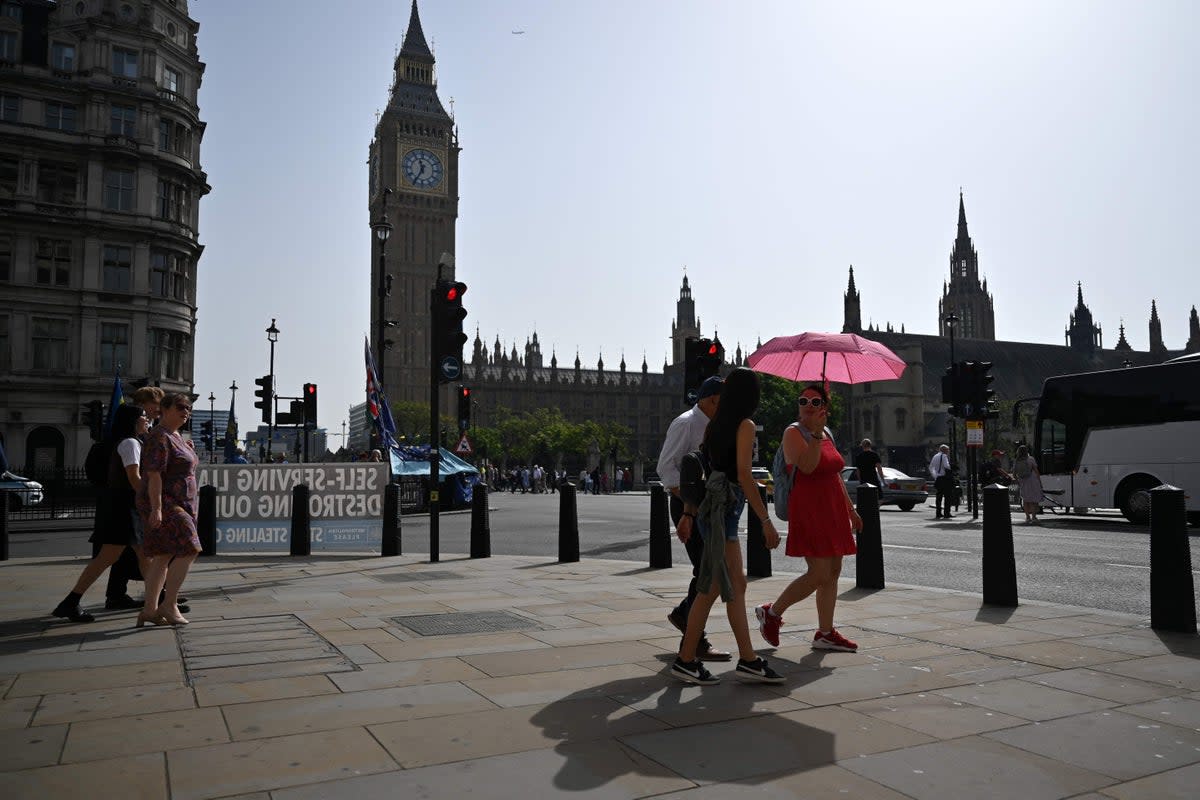 The ONS said "unseasonably warm weather" caused non-food sales to fall by 1.9% (AFP via Getty Images)