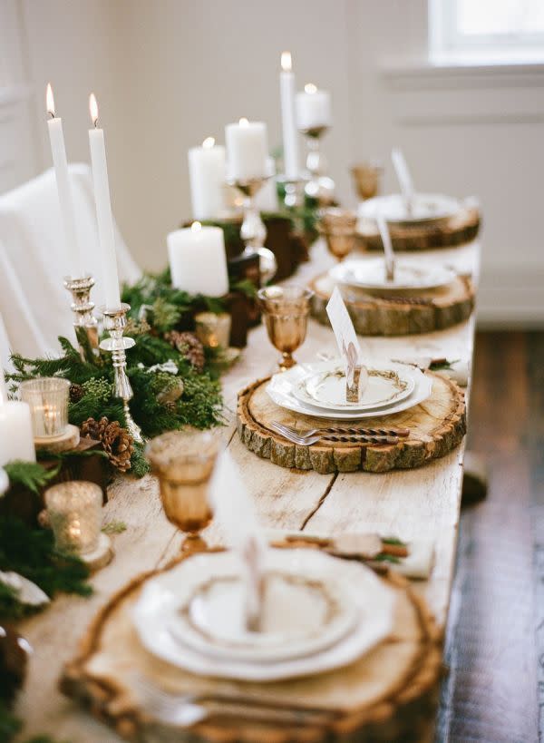 Creating Seasonal Place Settings Is Easy Add a wintry touch with rustic place mats and mini fur tree centre pieces. [Photo: Pinterest]