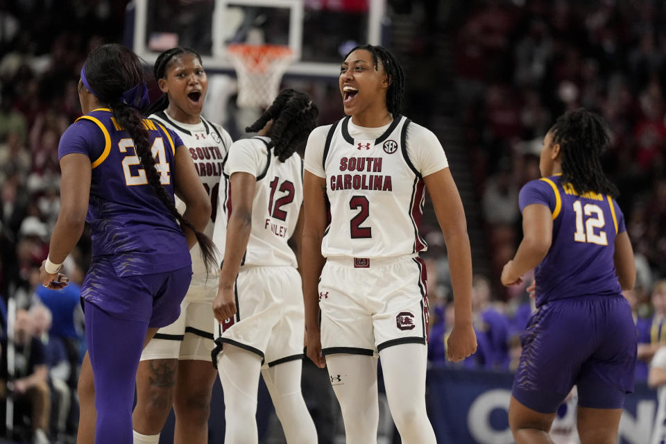 South Carolina forward Ashlyn Watkins celebrates after scoring during the second half of an NCAA college basketball game against LSU at the Southeastern Conference women's tournament final Sunday, March 10, 2024, in Greenville, S.C. (AP Photo/Chris Carlson)