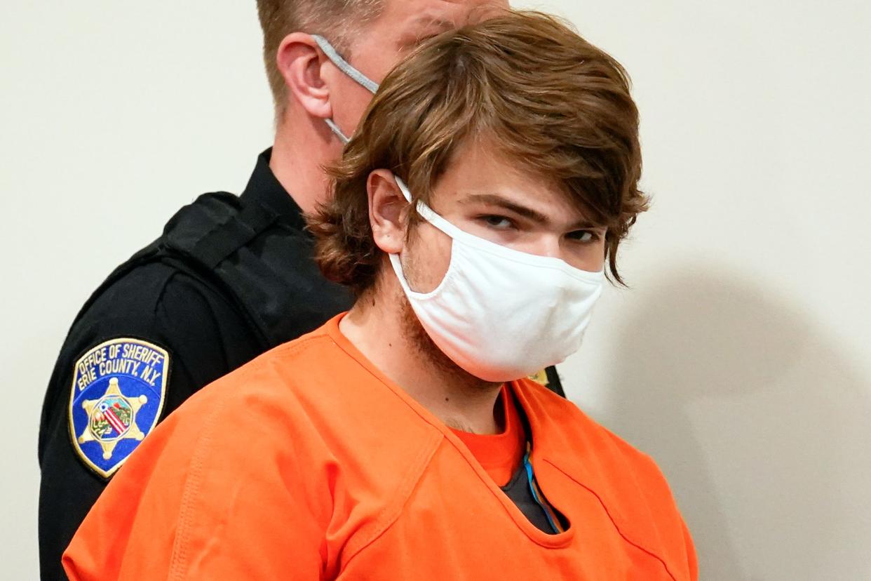 Payton Gendron is led into the courtroom for a hearing at Erie County Court, in Buffalo, N.Y., Thursday, May 19, 2022. 