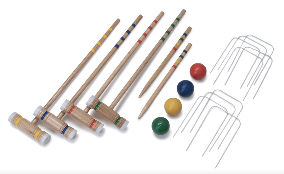 EastPoint 4 Player Sports Croquet Set with four paddles, four balls, and lawn sticks (Photo via Walmart)