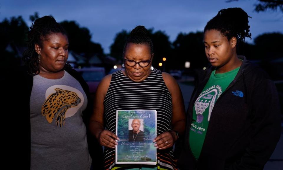 Michelle Branch holds a pamphlet from the memorial service of her younger brother, Craig Elazer, 56, who died from a fentanyl overdose.