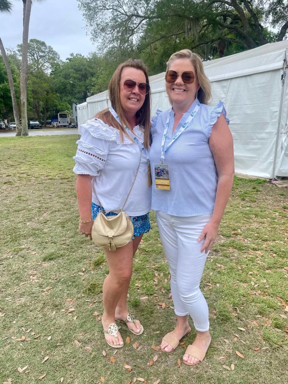 Beth and Theresa Hanning pose for a picture in Harbour Town after getting off of a trolley. The two women came to Hilton Head Island from New York to attend this year’s RBC Heritage Presented by Boeing.