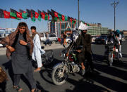 Taliban on motorbikes ride among people in Kabul, Afghanistan June 16, 2018. REUTERS/Mohammad Ismail