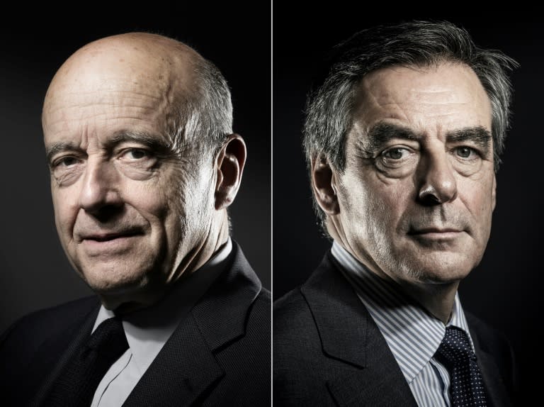 Former French prime ministers Alain Juppe (left) and Francois Fillon