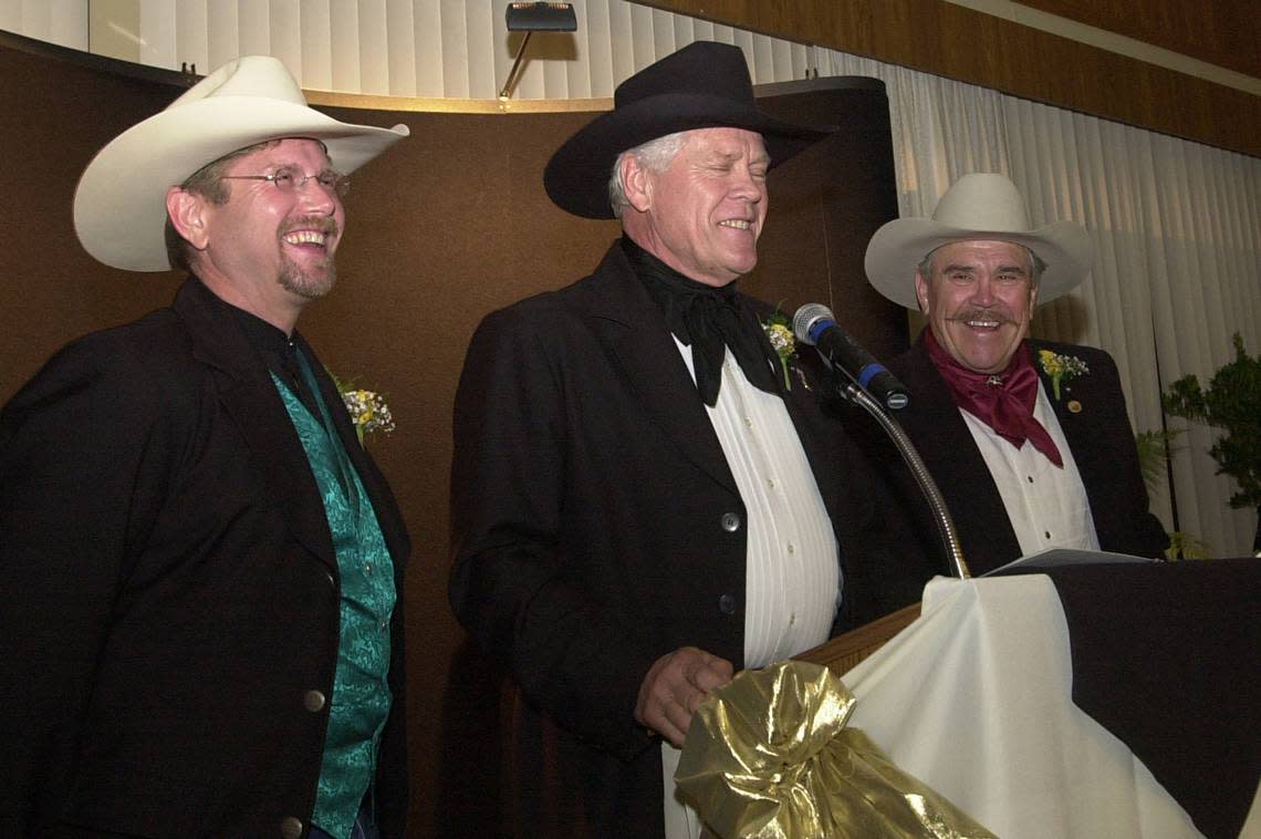 Jack Hannah, center, speaks of times past in the history of the Sons of the San Joaquin, as Lon Hannah, left, and Joe Hannah look on after their induction into the Clovis Hall of Fame in June 2003.