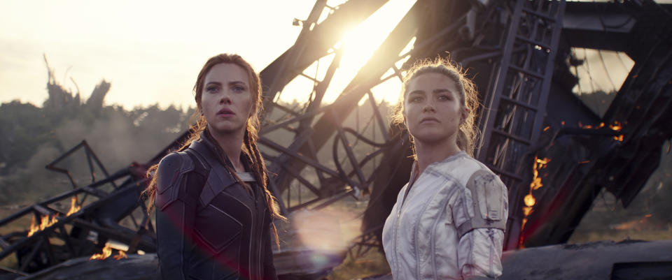 This image released by Marvel Studios shows Scarlett Johansson, left, and Florence Pugh in a scene from "Black Widow." (Marvel Studios-Disney via AP)