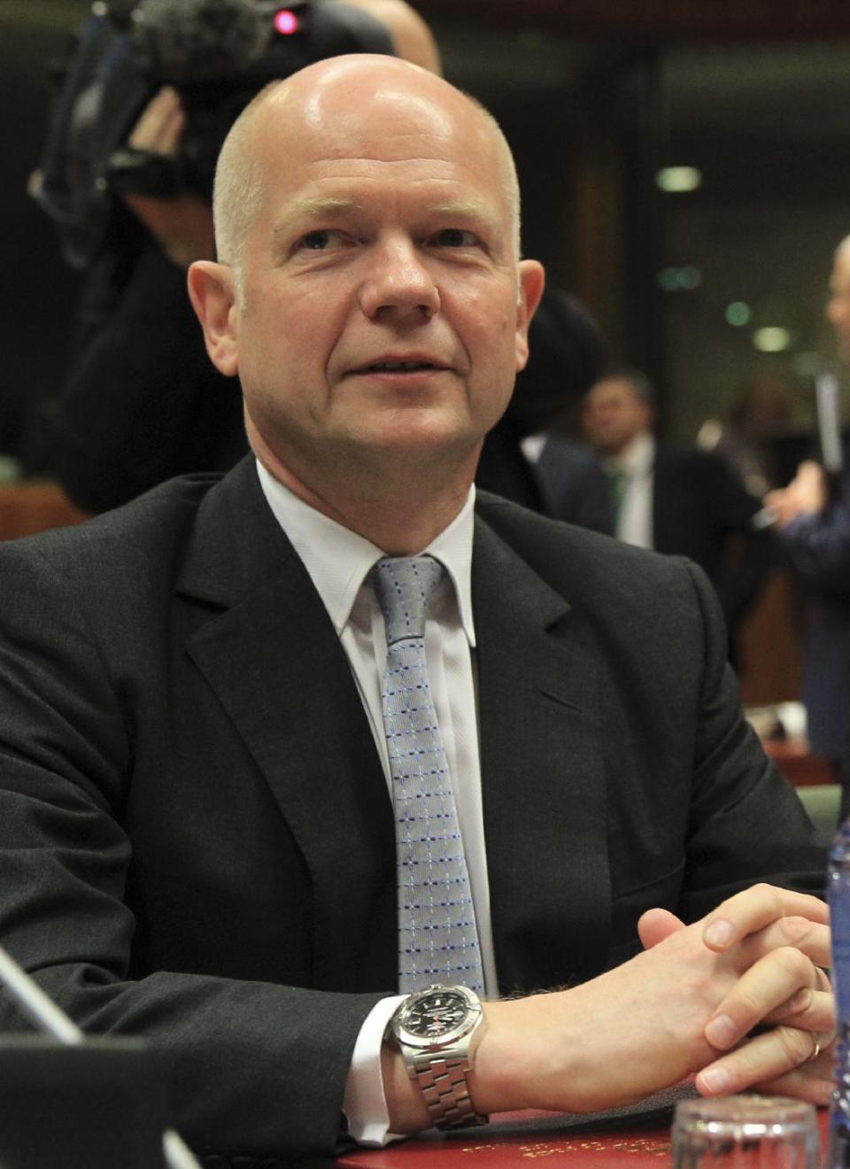 British Foreign Secretary William Hague attends an EU foreign ministers meeting at the European Council building in Brussels Monday, May 12, 2014. EU foreign ministers discuss the situation in Ukraine. (AP Photo/Yves Logghe)