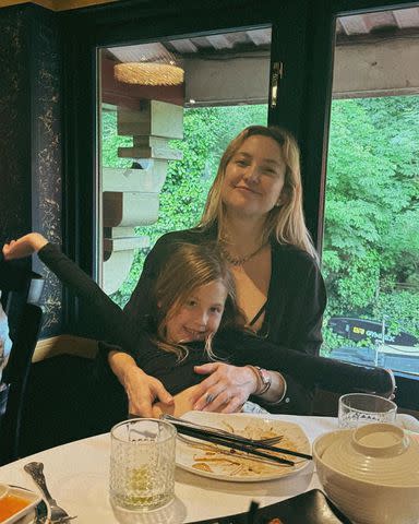 <p>Kate Hudson/Instagram</p> Kate Hudson and Rani Rose pose at a restaurant table