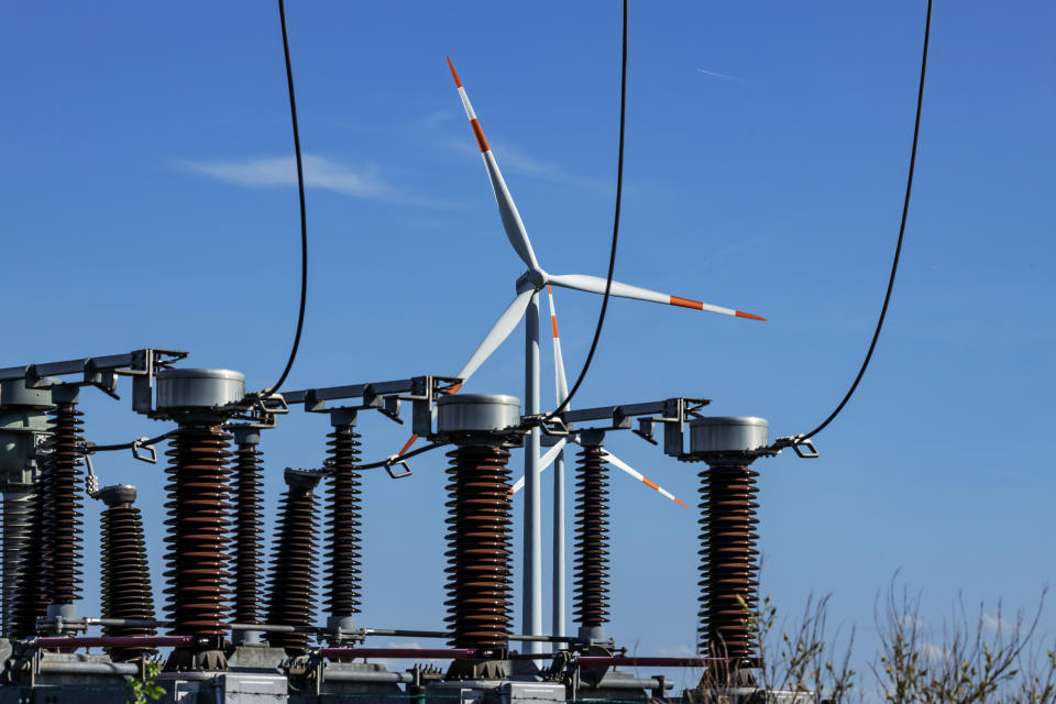 Electric transformer station with wind turbines