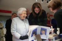 Britain's Queen Elizabeth II stands next to Caroline Rush, Chief Executive of the British Fashion Council (BFC), as she is given a tour of the London Fashion Week showrooms during her visit at London Fashion Week, in London, Britain February 20, 2018. REUTERS/Yui Mok/Pool