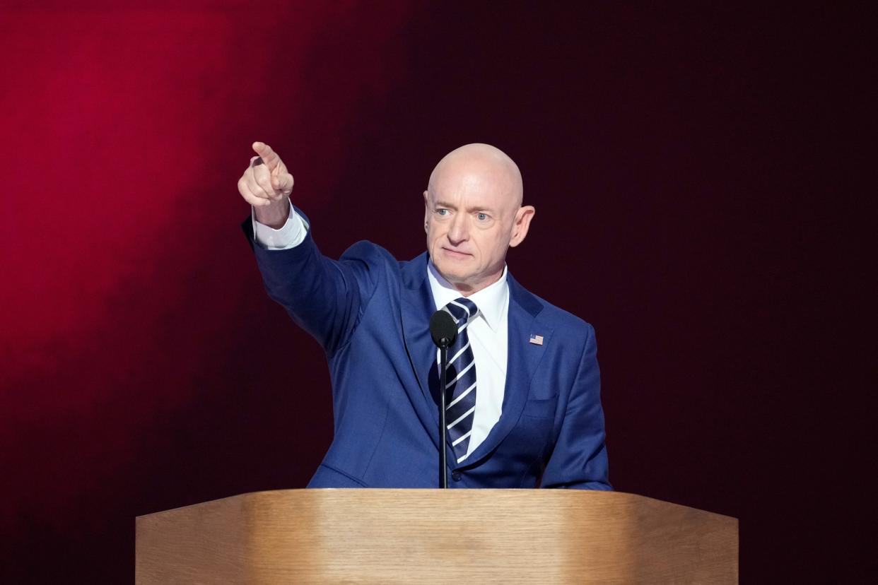 Arizona Sen. Mark Kelly speaks during the final day of the Democratic National Convention at the United Center.