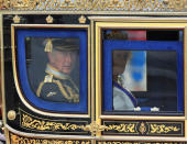 FILE PHOTO: Britain's Prince Charles and Camilla, Duchess of Cornwall, are driven by carriage from Buckingham Palace to the Houses of Parliament for the State Opening of Parliament in central London, Britain, May 18, 2016. REUTERS/Paul Hackett/File Photo