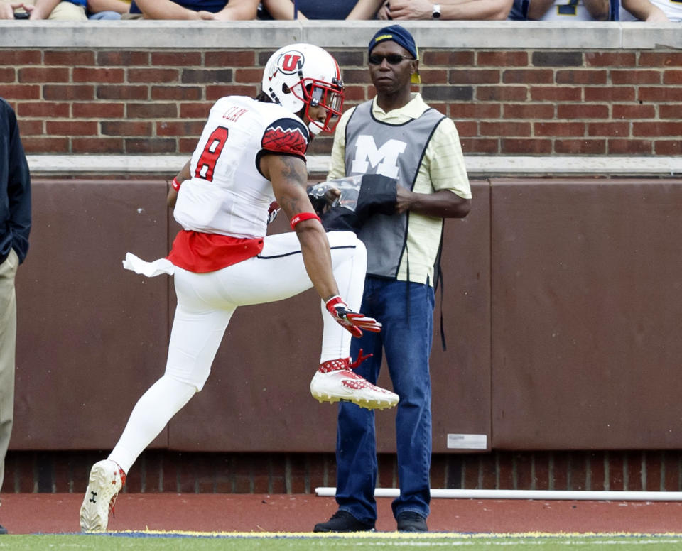 Kaelin Clay strikes the Heisman pose after his touchdown return. (USA Today)