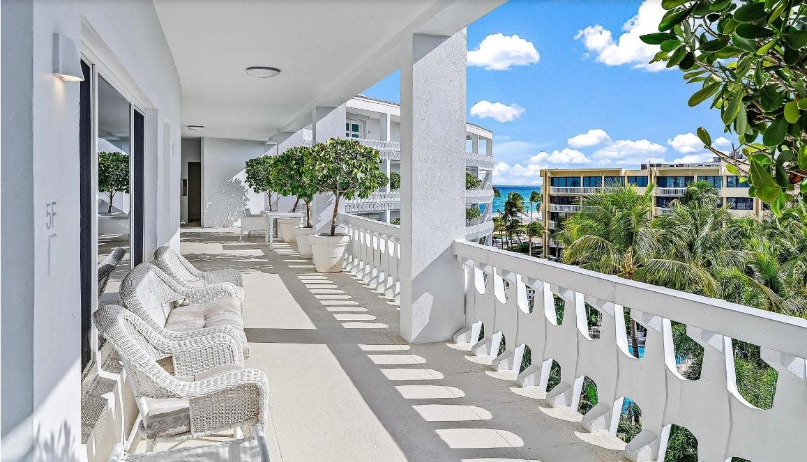 The front terrace of a co-operative apartment at 300 S. Ocean Blvd. in Palm Beach faces south and offers a view of the Atlantic Ocean at Midtown Beach. The one-bedroom unit, No. 5F, is listed at $2.995 million.