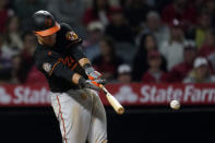 Baltimore Orioles' Ryan Mountcastle hits a two-run single during the seventh inning of the team's baseball game against the Los Angeles Angels on Saturday, April 23, 2022, in Anaheim, Calif. (AP Photo/Marcio Jose Sanchez)
