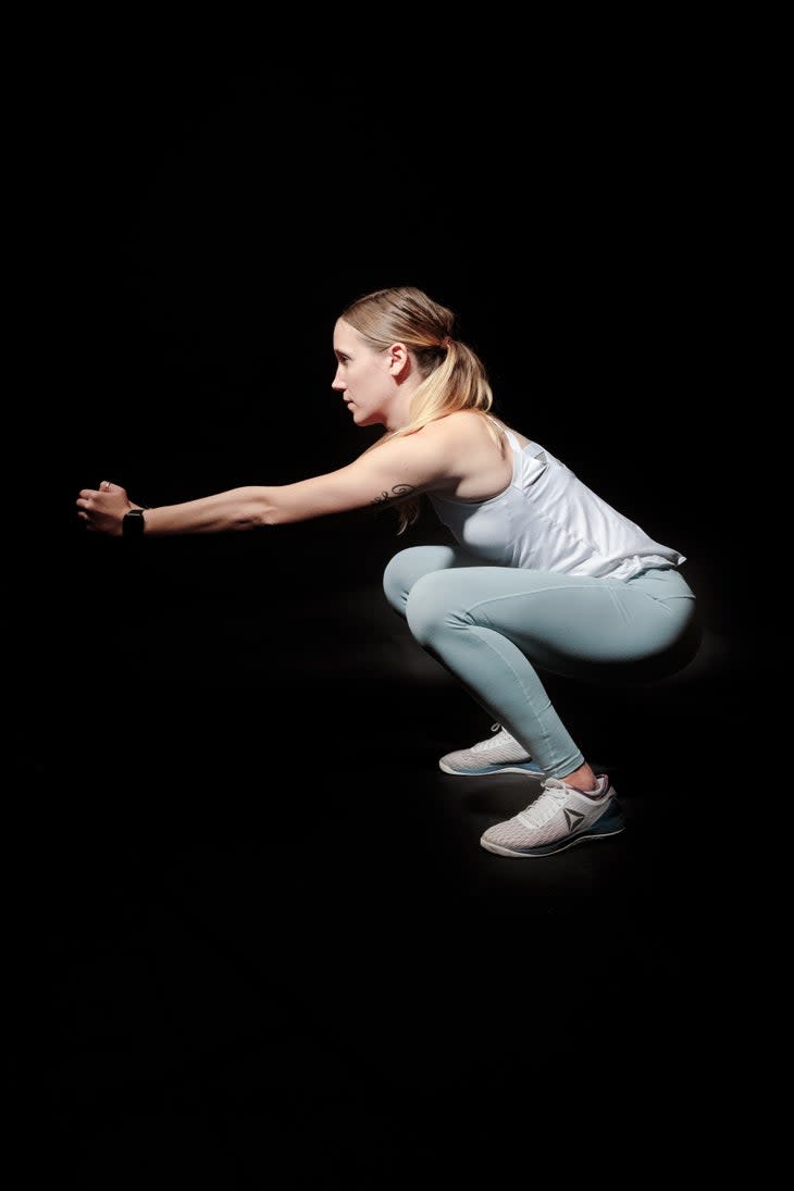 The squat: one of the best leg strengthening moves you can add to your ski fitness routine.