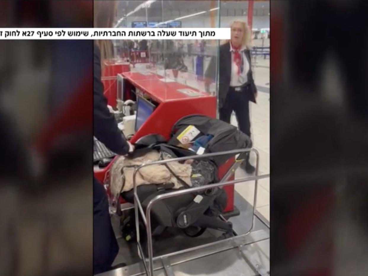 A cell phone video published by N12 appears to show the moments after a baby boy was abandoned this week by his parents at an airport in Tel Aviv