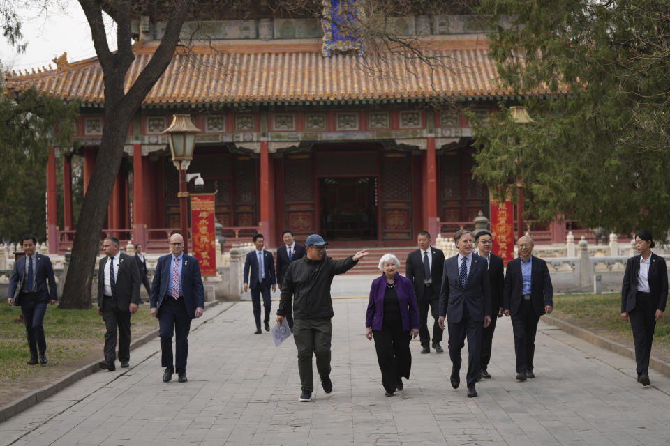U.S. Treasury Secretary Janet Yellen, center, and U.S. Ambassador to China Nicholas Burns, center right, visit the Guozijian Imperial College site in Beijing, China, Monday, April 8, 2024. The Biden administration will push China to change an industrial policy that poses a threat to U.S. jobs, Treasury Secretary Yellen said Monday after wrapping up four days of talks with Chinese officials. (AP Photo/Tatan Syuflana, Pool)