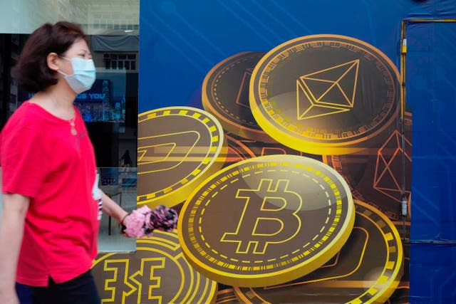 An advertisement for the Bitcoin cryptocurrency in Hong Kong (Vincent Yu/AP)