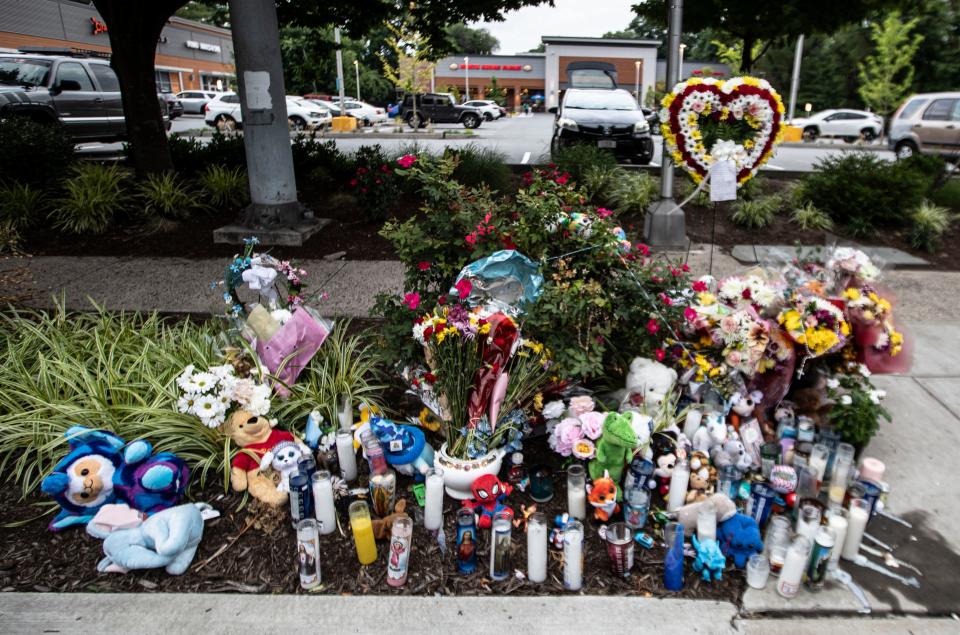 A memorial of flowers, toys and candles has grown on Mamaroneck Avenue at the crosswalk where six year-old Michael Volpe and his mother Molly Murphey Donovan were killed after being struck by a Royal Coach Lines mini-bus.