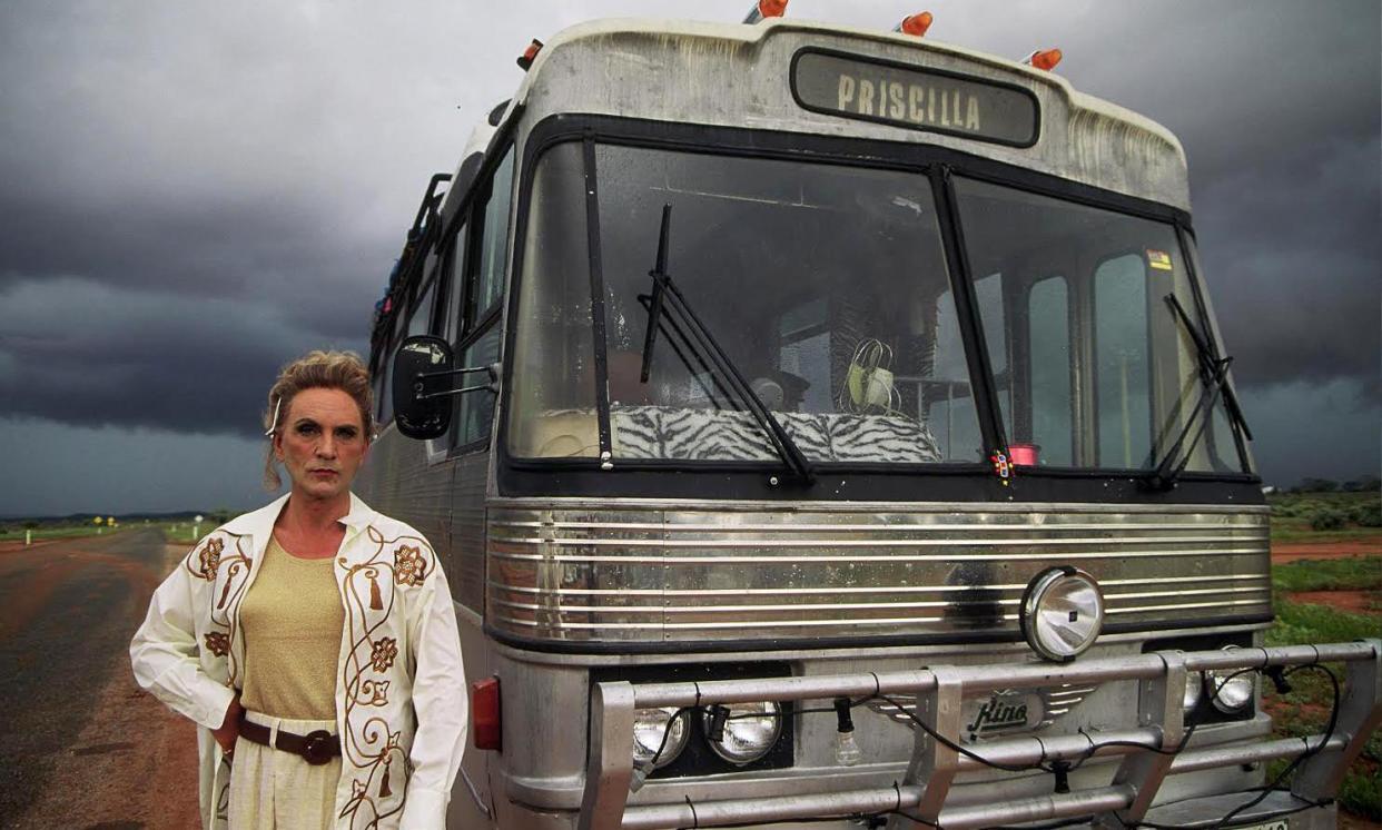 <span>Terence Stamp as Bernadette Bassenger beside Priscilla the bus in the 1994 Australian film The Adventures of Priscilla, Queen of the Desert.</span><span>Photograph: Latent Image Productions Pty Ltd.</span>