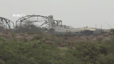 Remains of damaged plane are seen near the airport on the outskirts of Hodeidah, Yemen, June 20, 2018 in this still image taken from video. ARAB 24 via REUTERS
