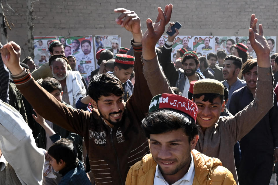 Pakistan Tehreek-e-Insaaf (PTI) party and former prime minister Imran Khan's supporters celebrate their lead in the country's national elections, in Peshawar, Feb. 9, 2024. / Credit: ABDUL MAJEED/AFP/Getty