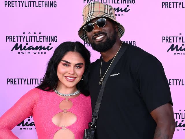 <p>Manny Hernandez/Getty</p> Chanen Johnson and Juwan Johnson attend the Pretty Little Things Miami Swim fashion show on July 15th, 2022.