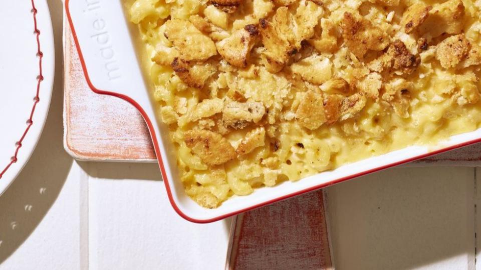 ritzy ranch mac and cheese in a white square baking dish with red trim