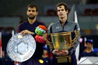 Tennis - China Open men's singles final - Beijing, China - 09/10/16. Bulgaria's Grigor Dimitrov and Britain's Andy Murray hold their trophies after their match. REUTERS/Thomas Peter