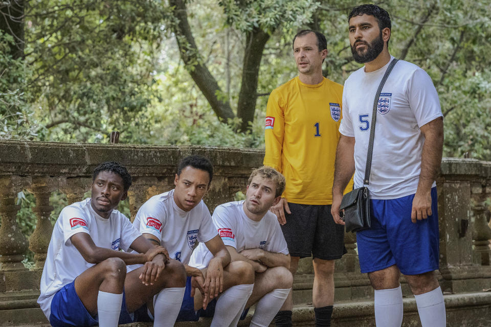 This image released by Netflix shows, from left, Sheyi Cole, Kit Young, Callum Scott Howells, Tom Vaughan-Lawlor and Robin Nazari in a scene from "The Beautiful Game." (Alfredo Falvo/Netflix via AP)