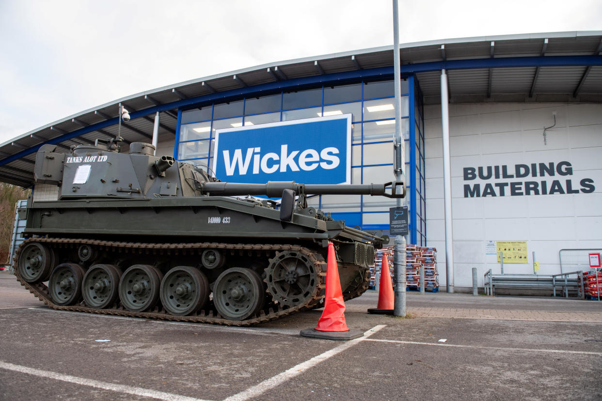 Tank parked outside of Wickes in Basingstoke, to protest against a customer's 'poor quality' kitchen fit, has now had a 14 day removal notice placed on to it. Basingstoke. January 30 2024. See SWNS story SWLStank.A man who parked a tank outside a Wickes in protest over a kitchen has been told it will be removed in 14 days - but says he's not budging.Paul Gibbons, 63, drove the vehicle to the Basingstoke store in a row over some work.Fed-up Paul has demanded a refund from Wickes for his â€œpoor qualityâ€ Â£25,000 kitchen installation at his home last February.He says it has been plagued with issues including mould under the sink, badly fitting units with a poor finish and one heavy drawer nearly collapsing on his dog.
