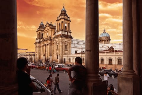 The sun goes down over Guatemala City - Credit: ALAMY