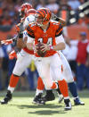 CINCINNATI, OH - OCTOBER 16: Andy Dalton #14 of the Cincinnati Bengals runs with the ball during the NFL game against the Indianapolis Colts at Paul Brown Stadium on October 16, 2011 in Cincinnati, Ohio. The Bengals won 27-17. (Photo by Andy Lyons/Getty Images)