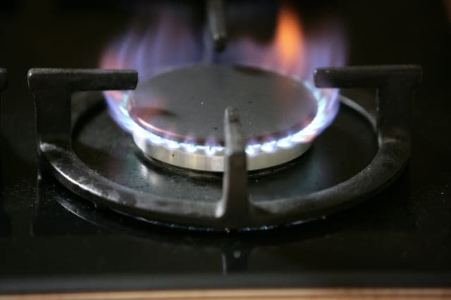 Burning gas flame of a gas cooker.