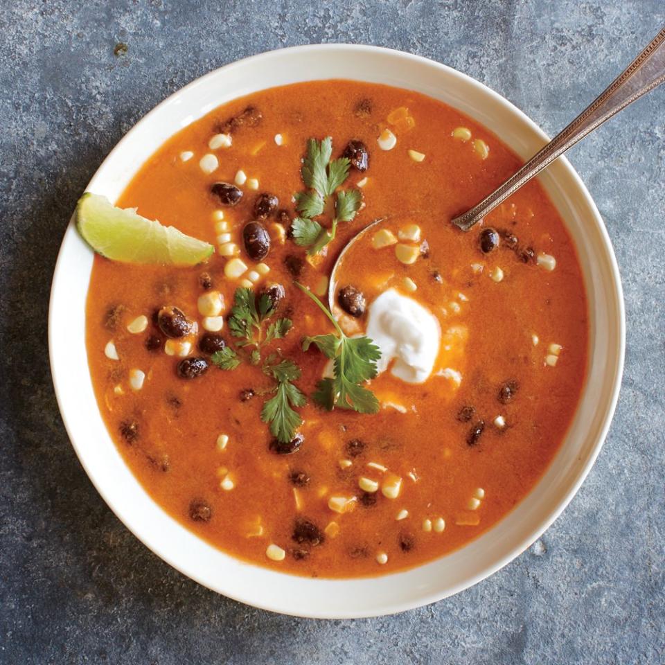 <p>Savor this Mexican-inspired chowder made with corn, black beans, red pepper, and onion. Top with a spoonful of sour cream or 2% Greek yogurt, a sprinkle of cilantro, and one lime wedge.</p> <p><a href="https://www.myrecipes.com/recipe/red-pepper-corn-black-bean-chowder" rel="nofollow noopener" target="_blank" data-ylk="slk:Red Pepper, Corn, and Black Bean Chowder Recipe;elm:context_link;itc:0;sec:content-canvas" class="link ">Red Pepper, Corn, and Black Bean Chowder Recipe</a></p>