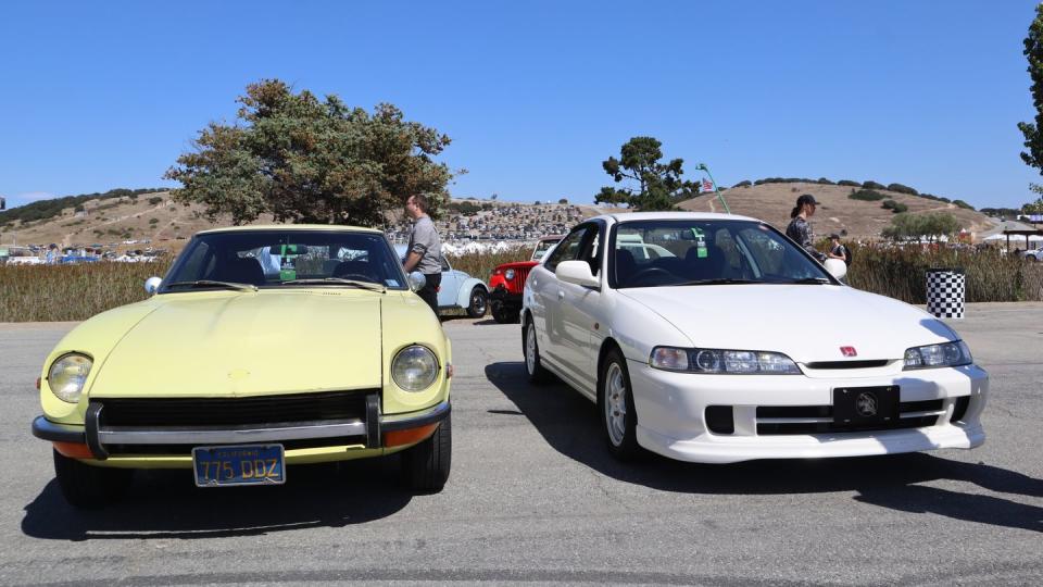 rolex monterey motorsports reunion 2023 yellow datsun 240z and white japanese imported acura integra type r