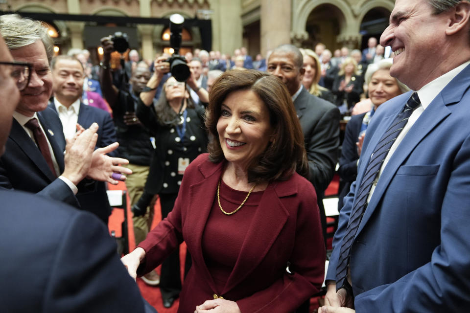 New York Gov. Kathy Hochul greets people as she arrives to deliver her State of the State address in Albany, N.Y., Tuesday, Jan. 9, 2024. The Democrat outlined her agenda for the ongoing legislative session, focusing on crime, housing and education policies. (AP Photo/Seth Wenig)