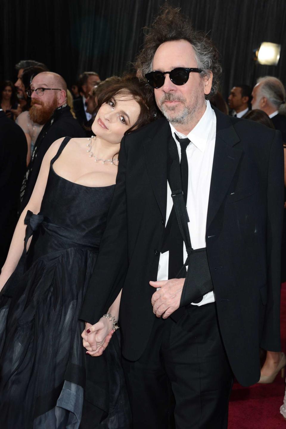 Helena Bonham Carter and director Tim Burton arrive at the Oscars at Hollywood & Highland Center on February 24, 2013 in Hollywood, California