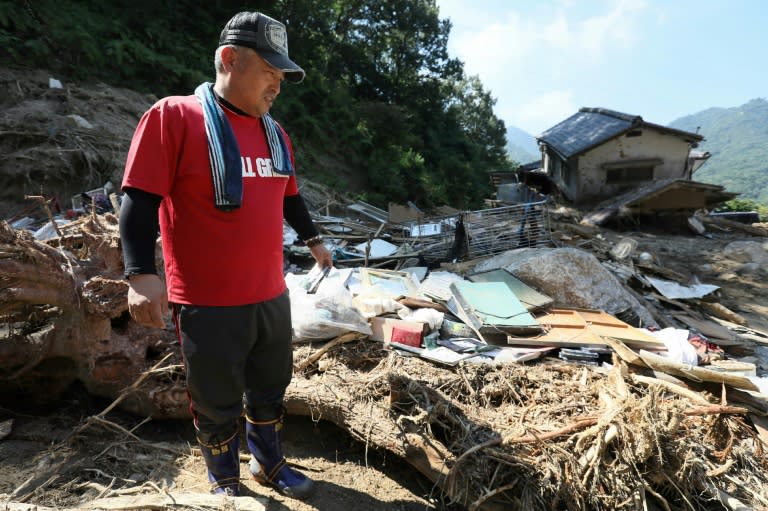 Tens of thousands of rescue workers are still digging through the debris for bodies after Japan's worst weather-related disaster in over three decades, which saw record downpours spark flash flooding and landslides across the region