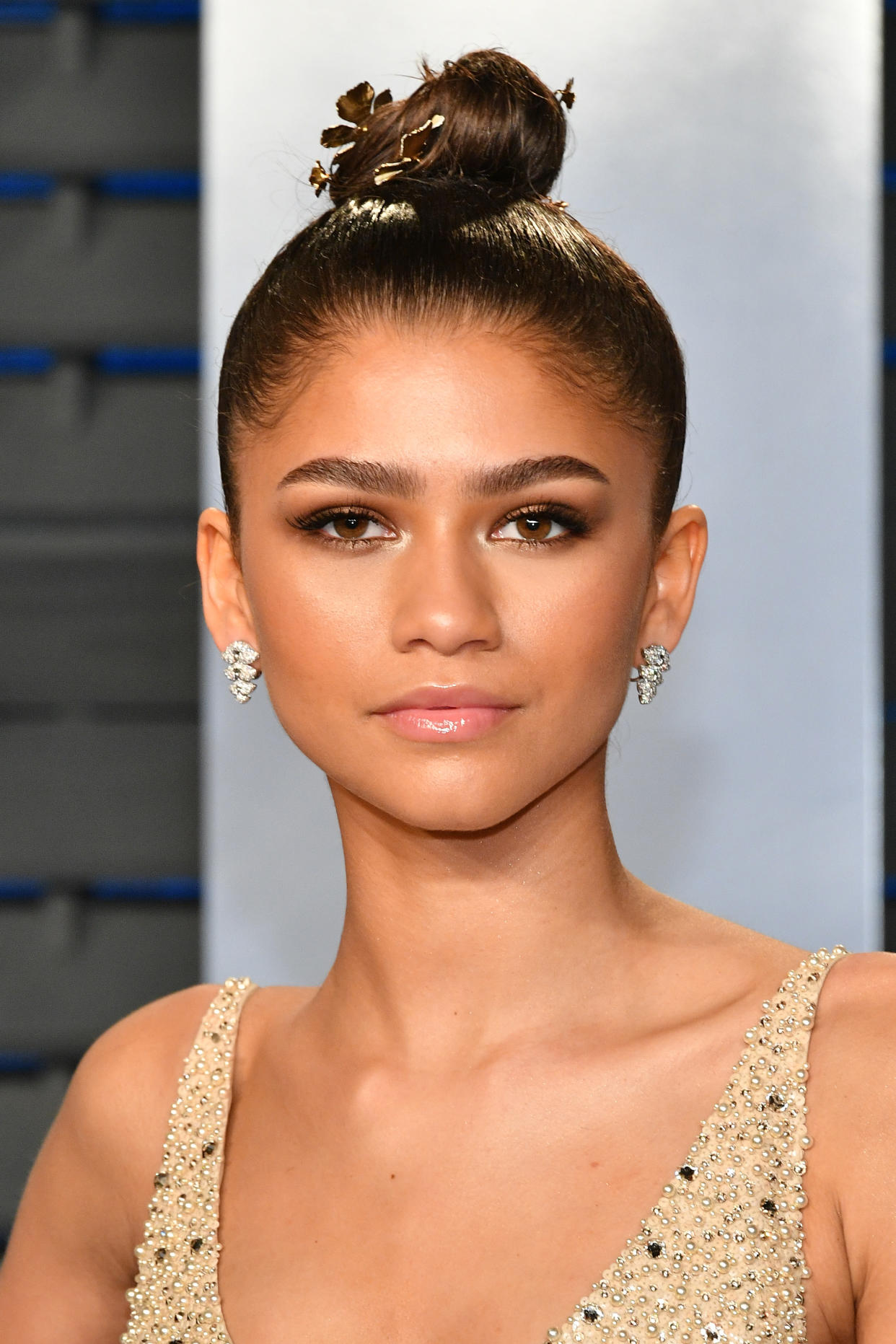 Zendaya, pictured in full glam mode at the 2018 Oscars, has opted for a softer look. (Photo: Dia Dipasupil/Getty Images)