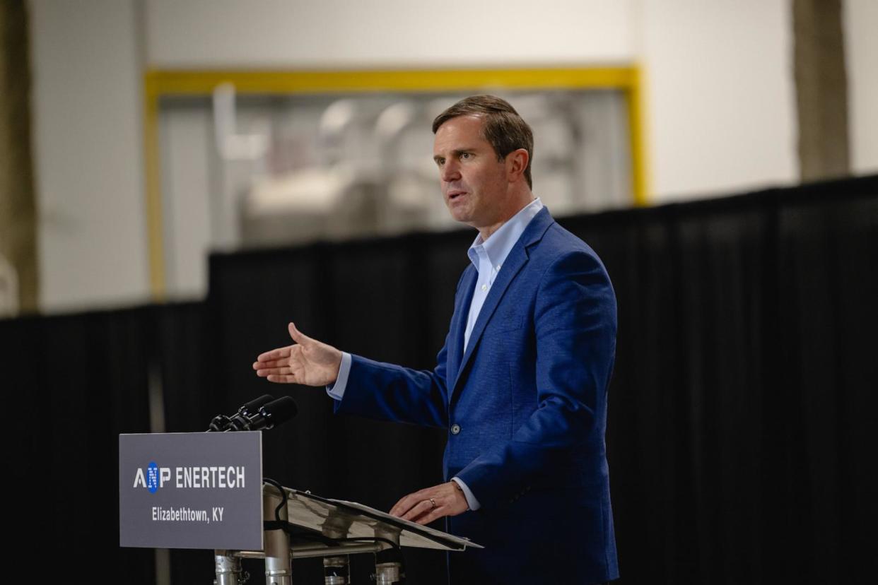 PHOTO: Andy Beshear, governor of Kentucky, speaks following a tour of the new Advanced Nano Products (ANP) battery facility in Elizabethtown, Ky., March 13, 2024.  (Jon Cherry/Bloomberg via Getty Images)