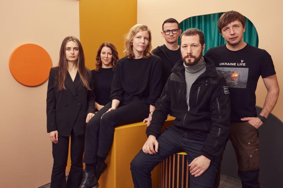 (L-R) Vasilisa Stepanenko, Raney Aronson-Rath, Michelle Mizner, Derl McCrudden, Mstyslav Chernov and Evgeniy Maloletka of '20 Days in Mariupol' pose for a portrait at Getty Images Portrait Studio at Stacy's Roots to Rise Market on Jan. 23, 2023 in Park City, Utah. (Emily Assiran/Contour by Getty Images for Stacy's Pita Chips)