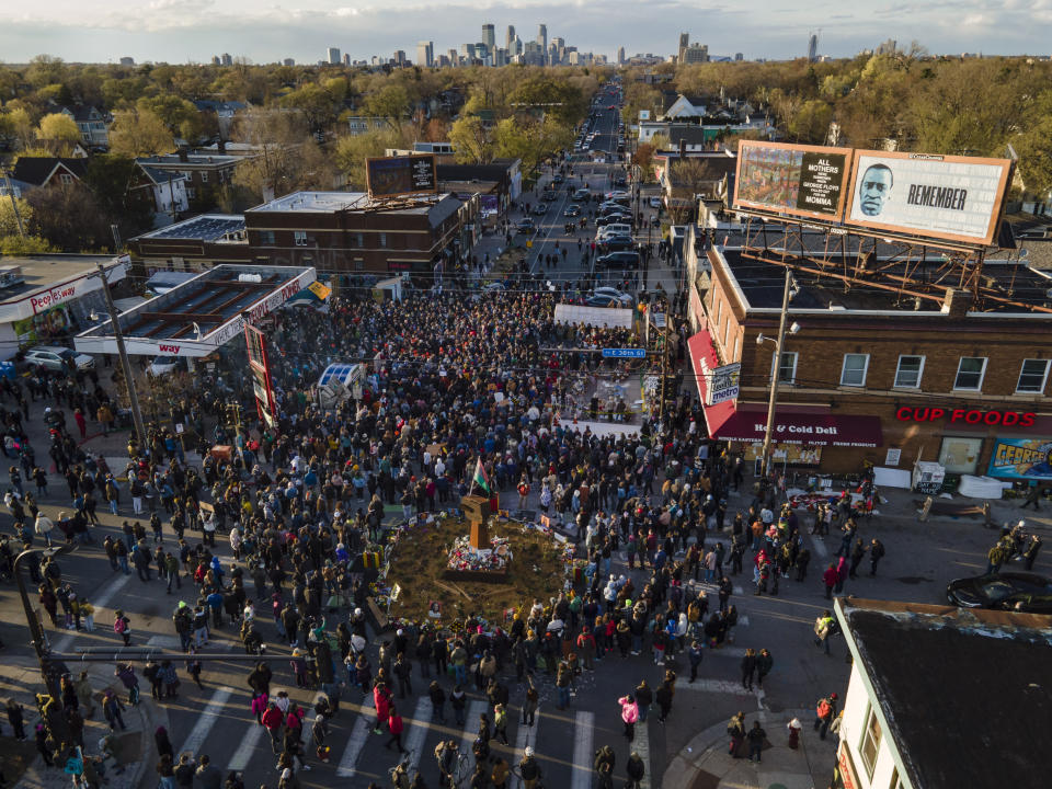 A crowd gathers at George Floyd Square after a guilty verdict was announced at the trial of former Minneapolis police Officer Derek Chauvin for the 2020 death of Floyd, Tuesday, April 20, 2021, in Minneapolis. Former Minneapolis police Officer Derek Chauvin has been convicted of murder and manslaughter in the death of Floyd. (AP Photo/Julio Cortez)