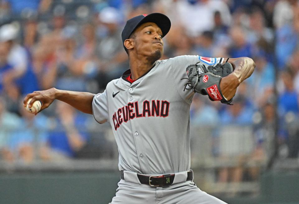 Cleveland Guardians starting pitcher Triston McKenzie (24) delivers a pitch in the first inning Friday against the Kansas City Royals in Kansas City, Missouri.