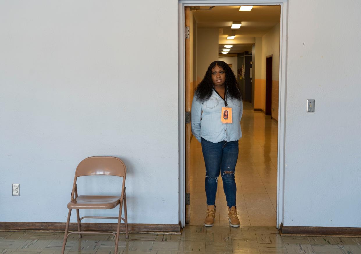 Angeleila Watkins stands in the doorway on Feb. 5 at a warming center at Summit United Methodist Church in Columbus.