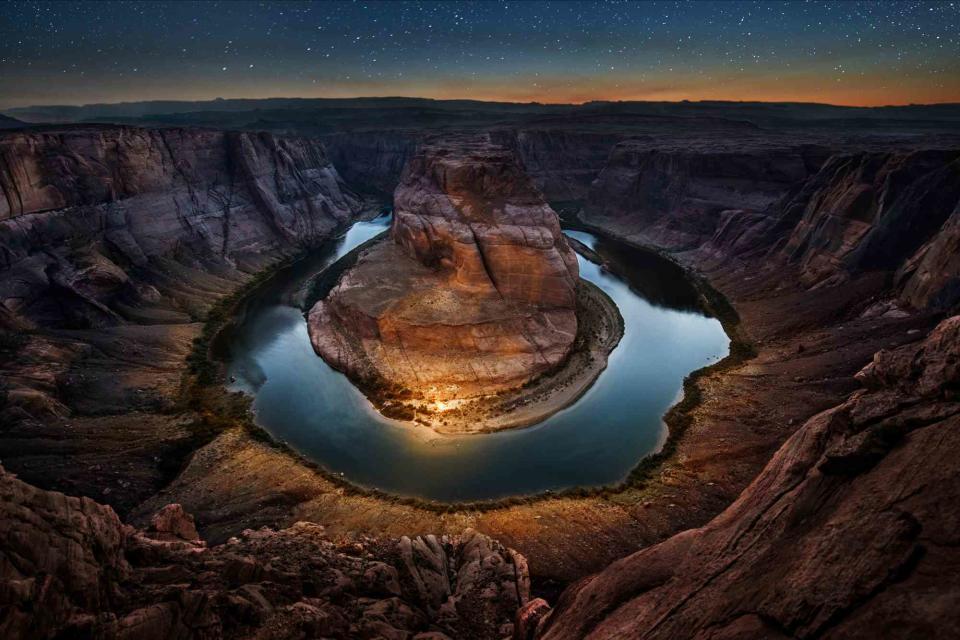 <p>Cavan Images/Getty Images</p> Horseshoe Bend, a canyon with the Colorado River outside Page, Arizona.