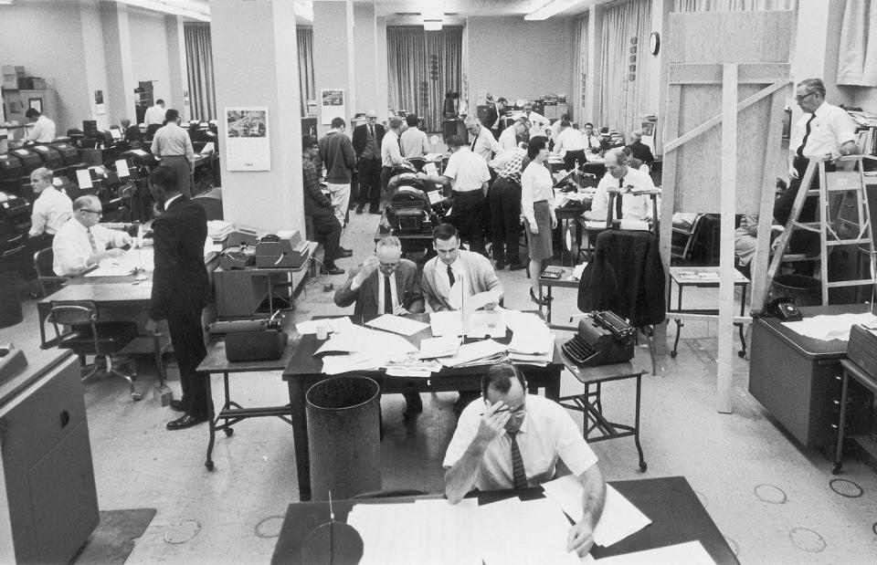 Staffers work on election night at the Washington bureau of the Associated Press on Nov. 3, 1964. (AP Photo)