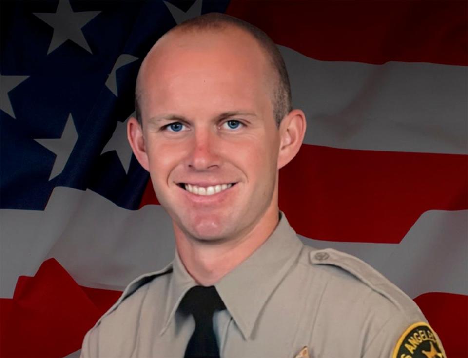 This undated photo provided by Los Angeles County Sheriff’s Department shows its Deputy Ryan Clinkunbroomer. (LACSD)